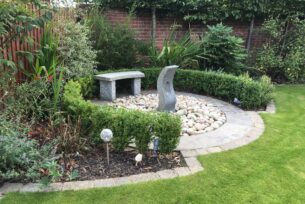  Stone water feature with garden design and seating