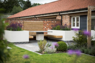  Modern garden design using rendered raised beds and build in seating