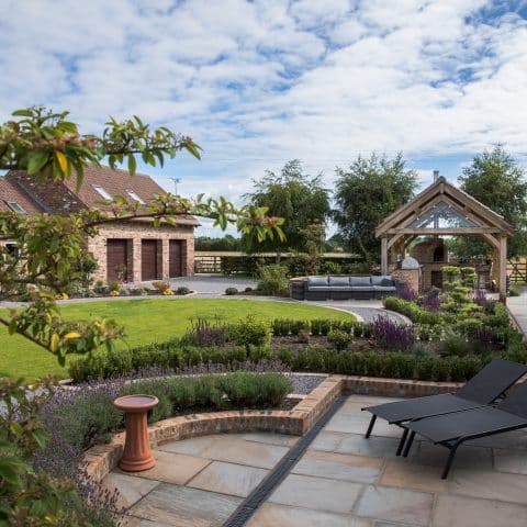 Garden Design and build in York with an Oak structure and brick build outdoor kitchen