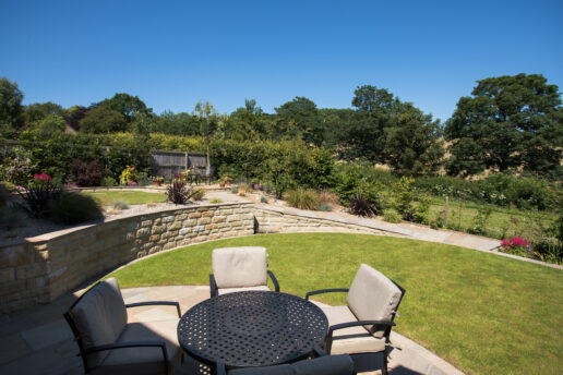 curved stone walling to create usable garden in Thornton Le Dale